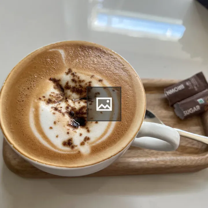 Cup of cappuccino with foam art