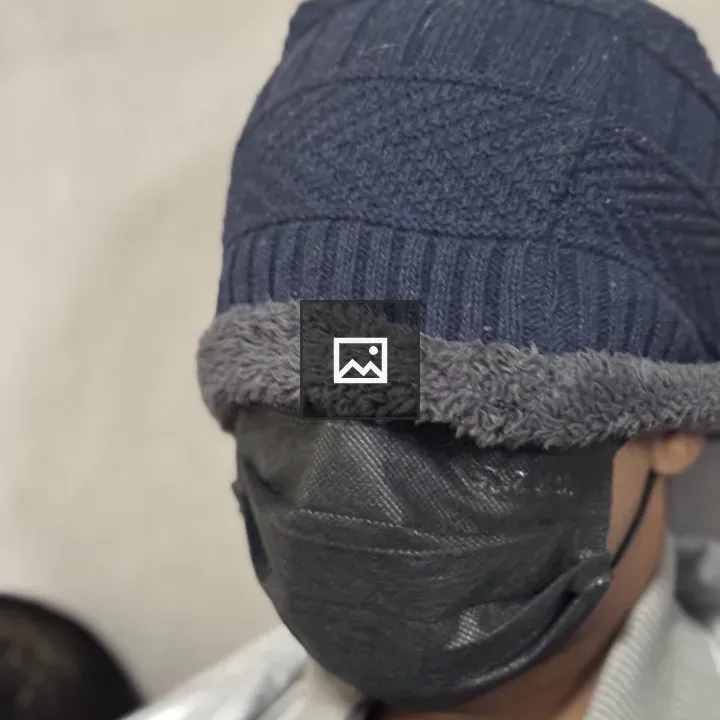 Person in Beanie and Mask