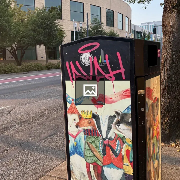 Public trash can with artwork