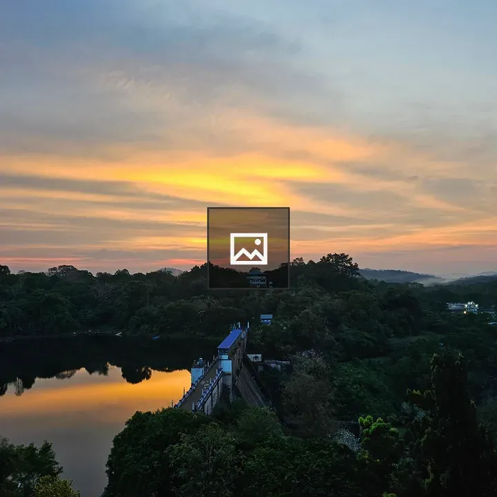 Dam and reservoir at sunset