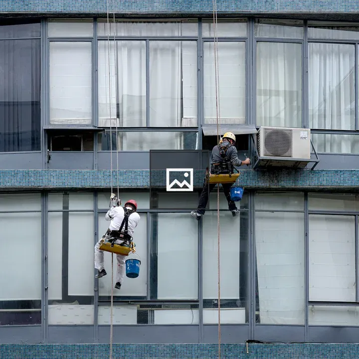 Two Window Cleaners on Ropes