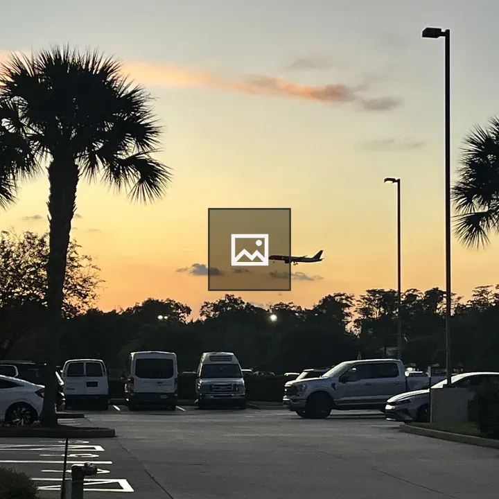 Sunset Sky with Airplane Silhouette