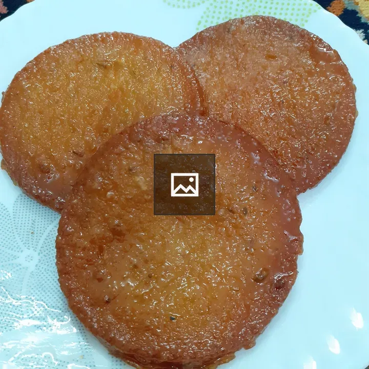 Malpua dessert on tableware