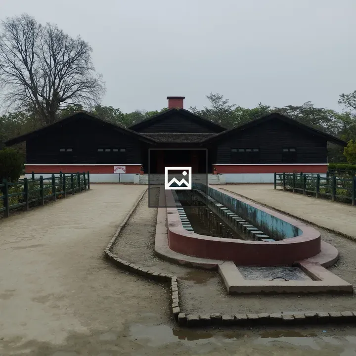 Thatched-roof Building with Water Feature