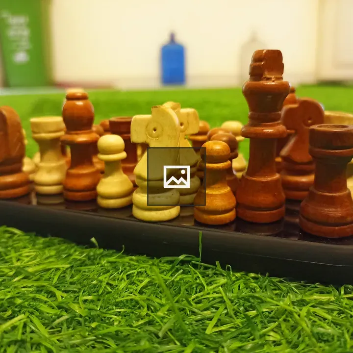 Chess coins on a mobile phone