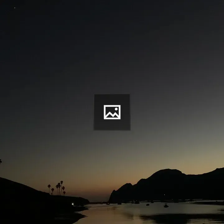 Silhouette of a Bay Inlet at Dusk