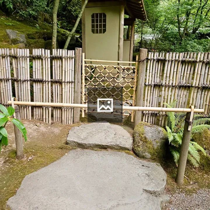 Tea house behind bamboo fence