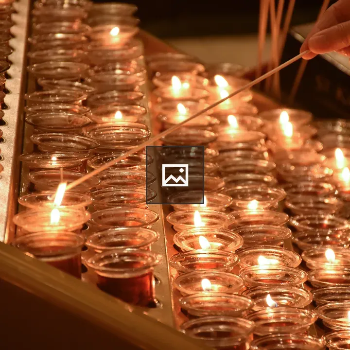 Rows of candles lit
