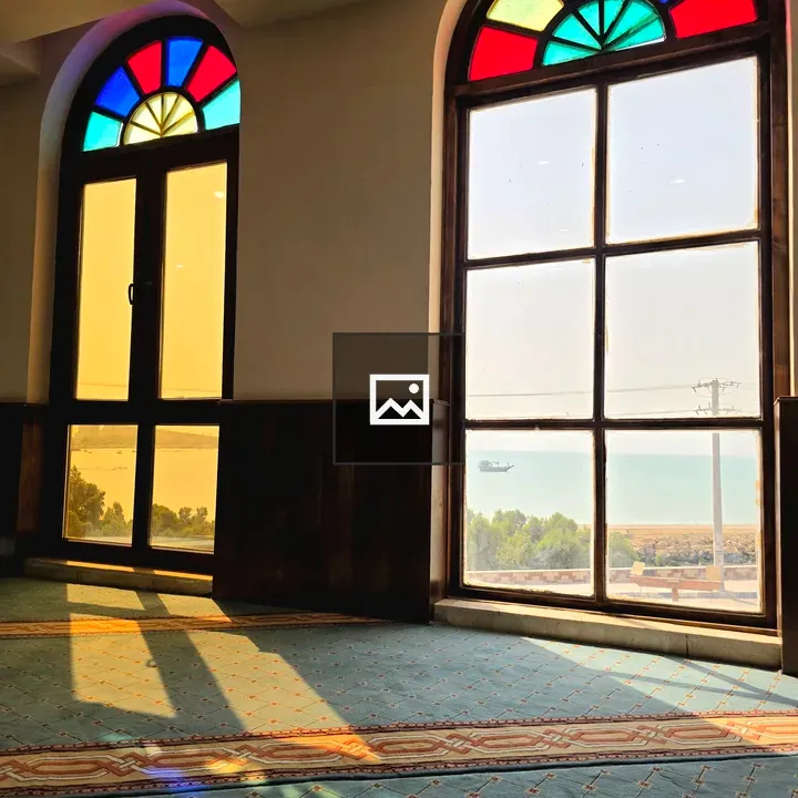 Arched stained-glass windows room