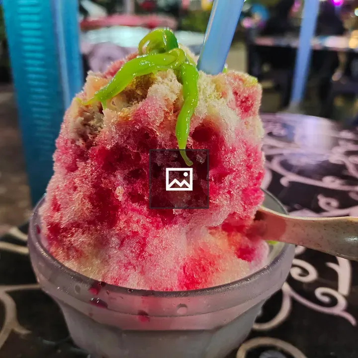 Pink ice cream with toppings
