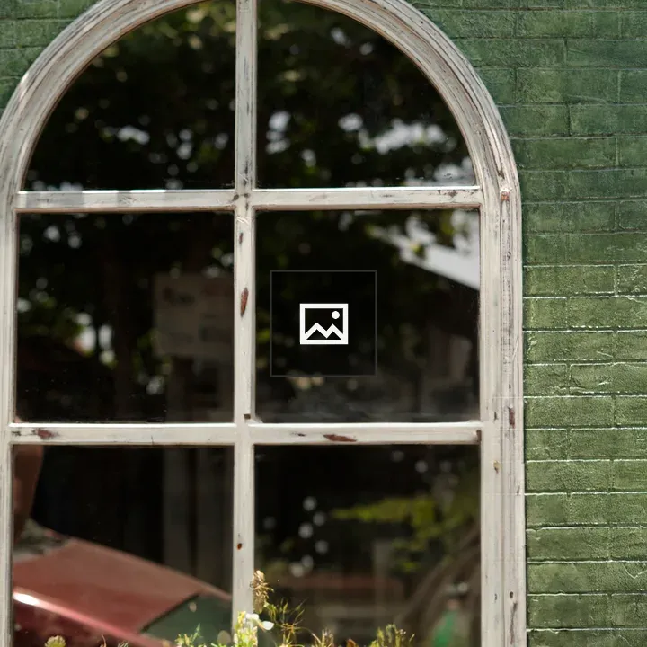 Vintage window with curved design