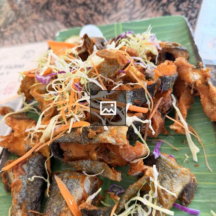 Fried fish on banana leaf