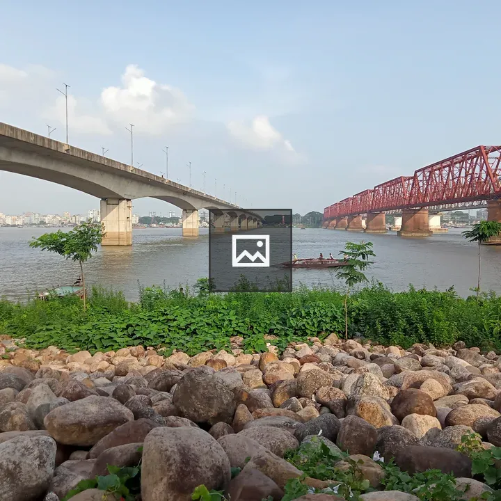 Bridge Scene Over River with Boat