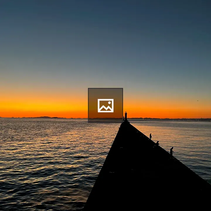 Sunset over the lake pier