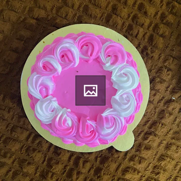 Round Pink Cake with Rosettes