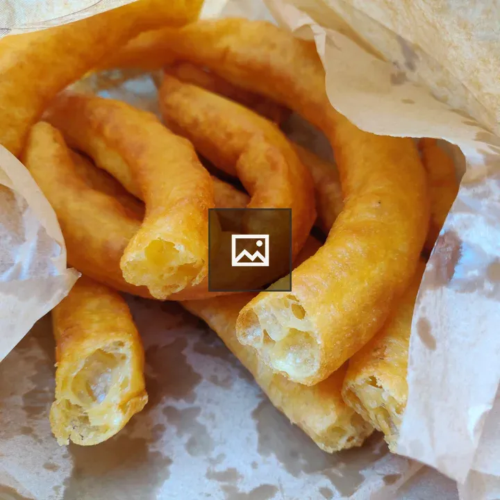 Churros on White Plate