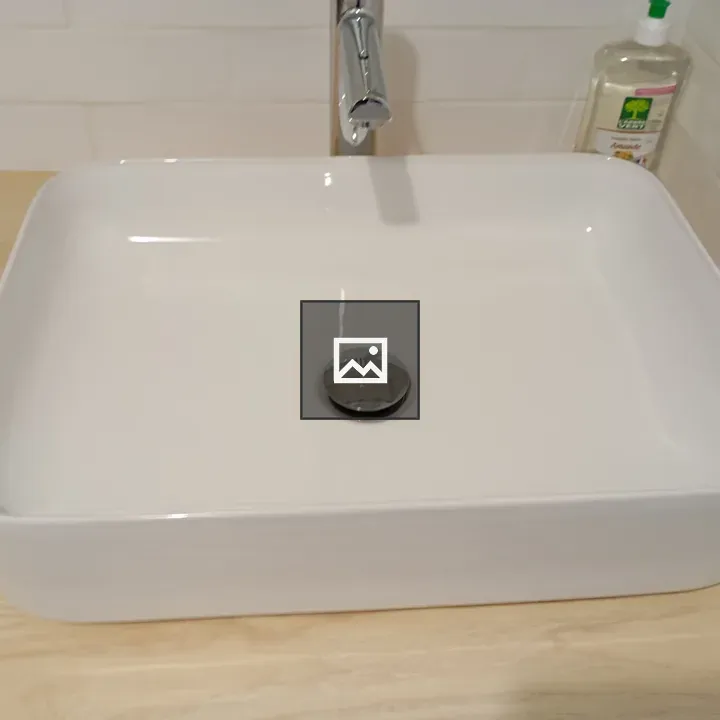 Bathroom sink on wooden table