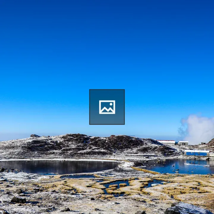 Snowy hills and blue sky landscape