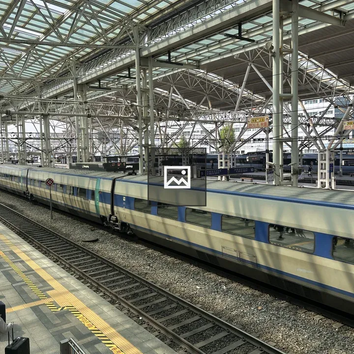 Modern train station with sleek train
