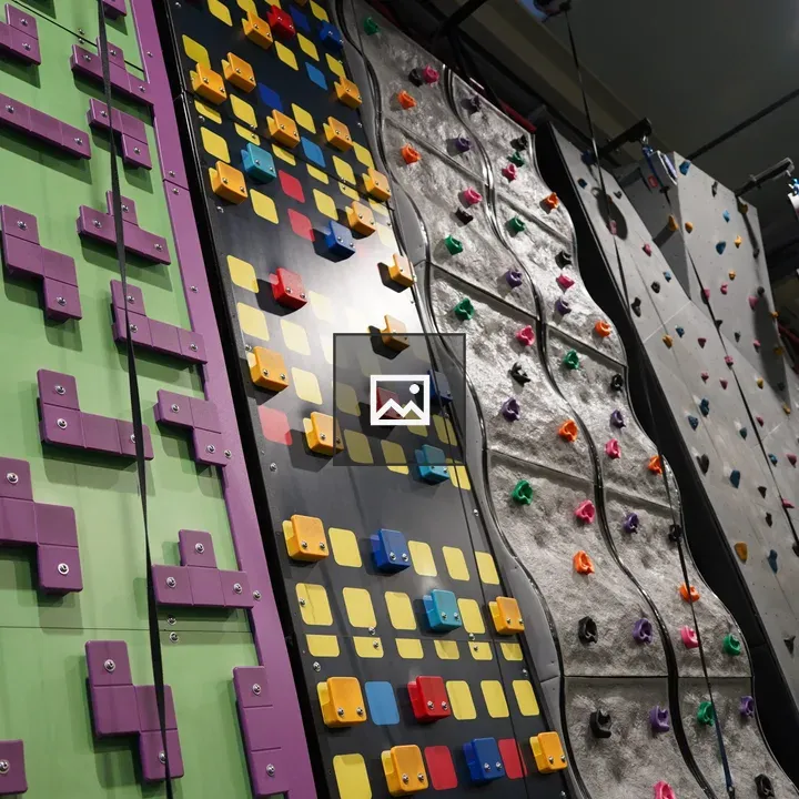 Indoor climbing walls with colorful holds