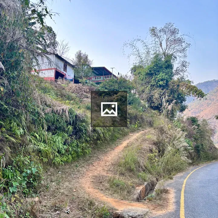 Winding Dirt Path Through Hillside