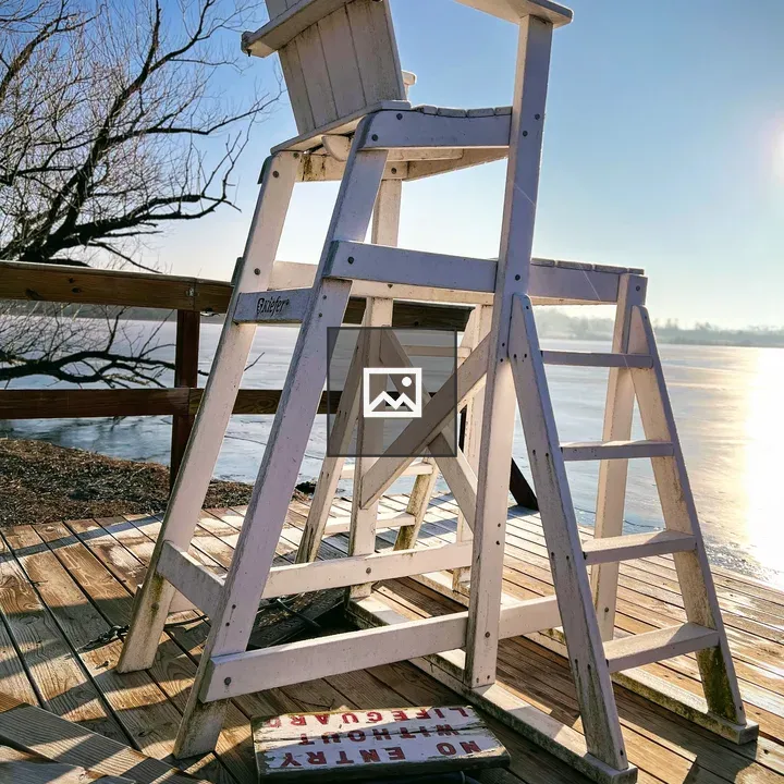 Lifeguard chair at sunrise dock