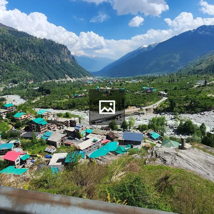 Mountains with Clouds and Homes