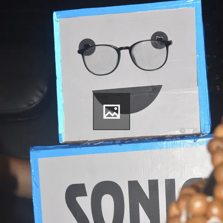 Boxy robot figure with Sonic on torso
