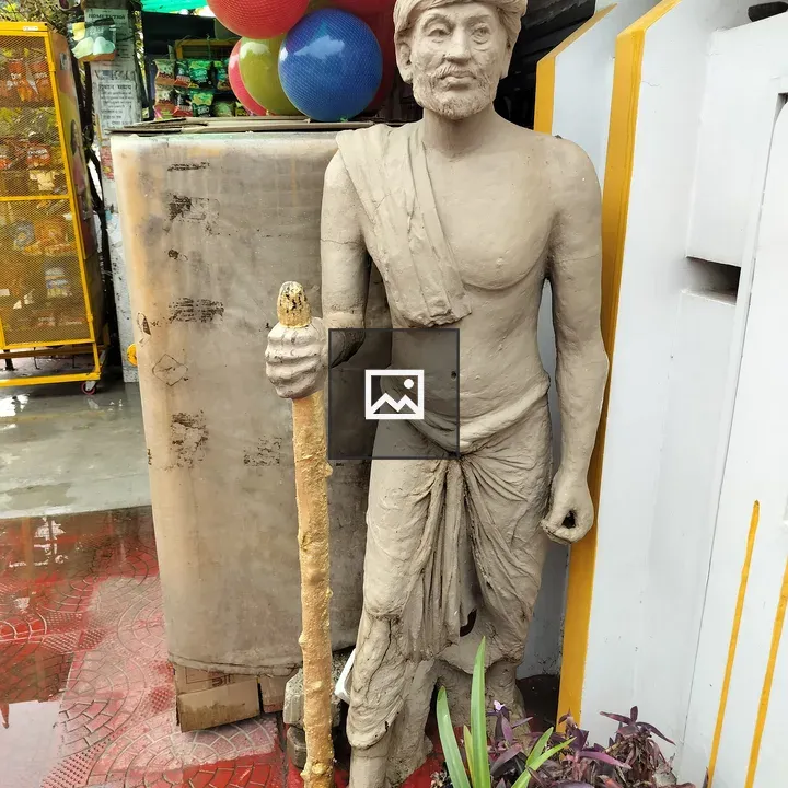 Clay Sculpture of an Old Man