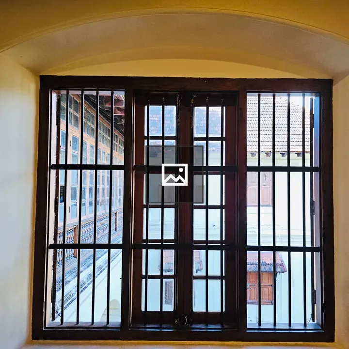 Traditional wooden window with grills