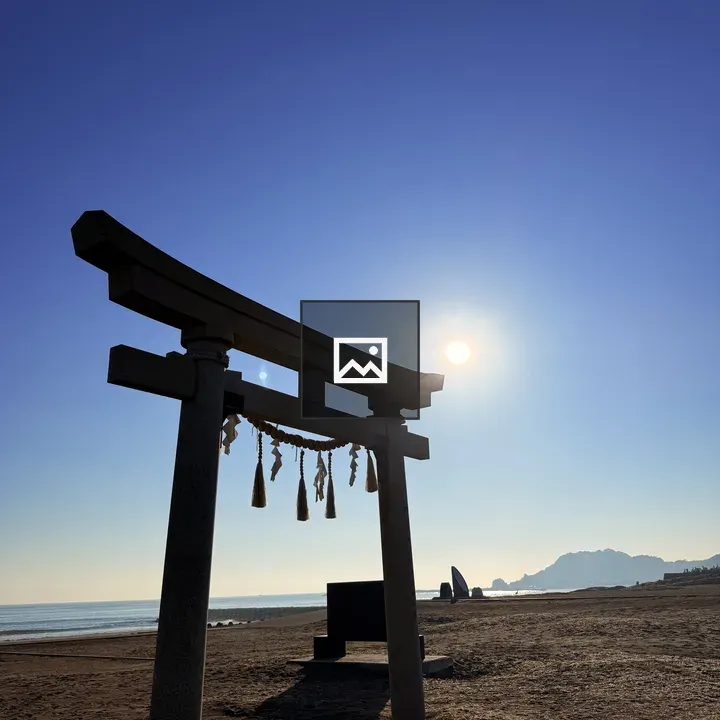 Seaside torii gate at sunrise