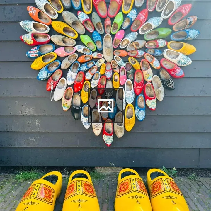 Heart-shaped wall of wooden shoes