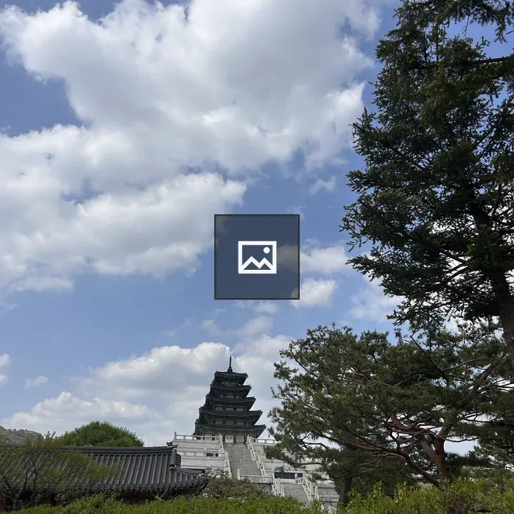 Pagoda atop steps with greenery