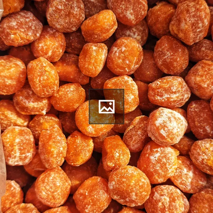 Orange honey candies close-up