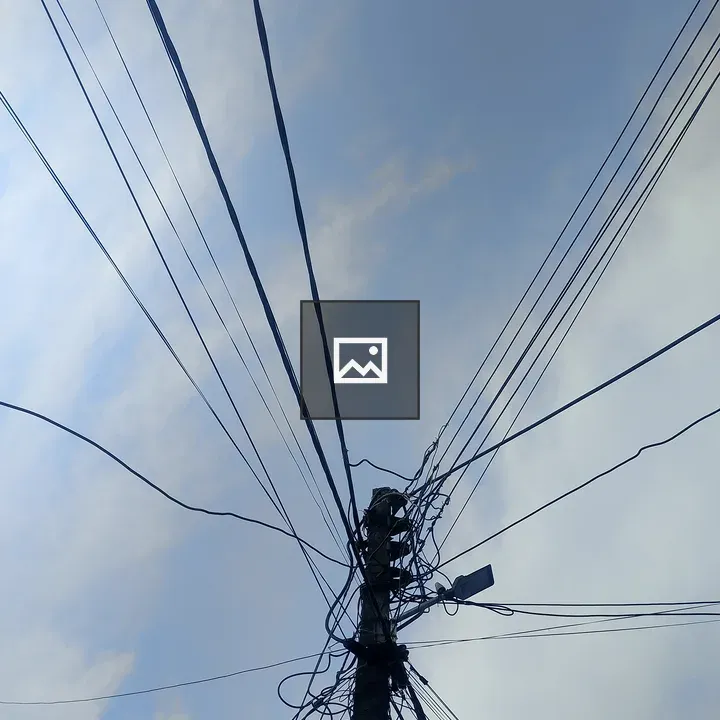 Utility Pole with Tangled Wires