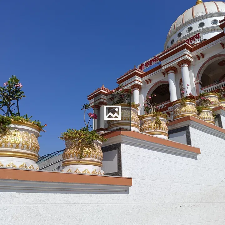 White Building with Gold and Red Trim
