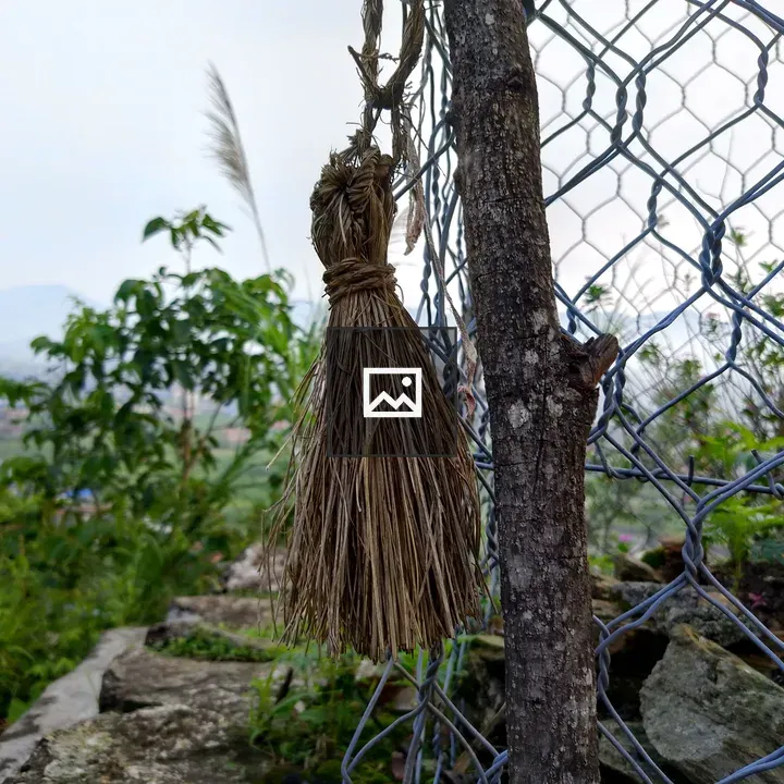 Small handmade straw broom