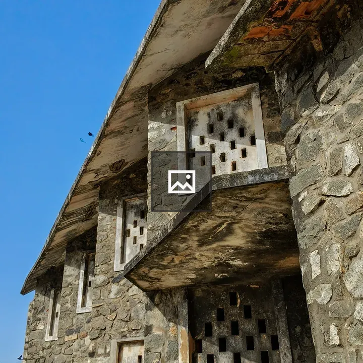 Abandoned stone building at Poovar Beach