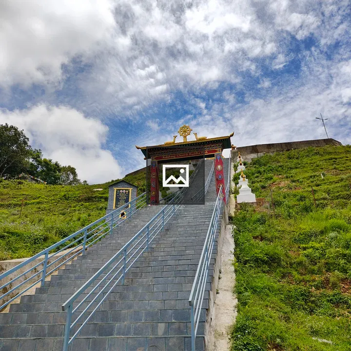 Stone staircase with colorful archway