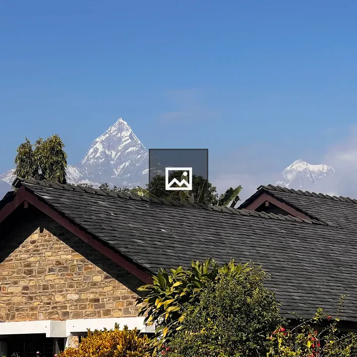 Blue Sky Over Cottage Roof
