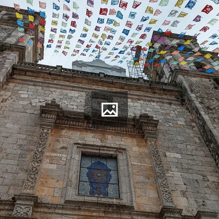 Banners over a church in Cancun