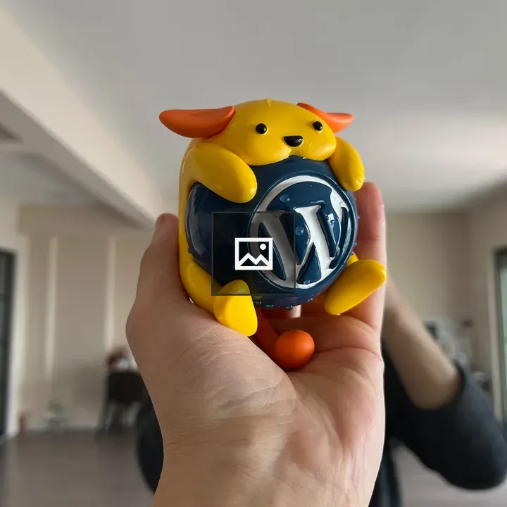 Wapuu in Hand by Mirror