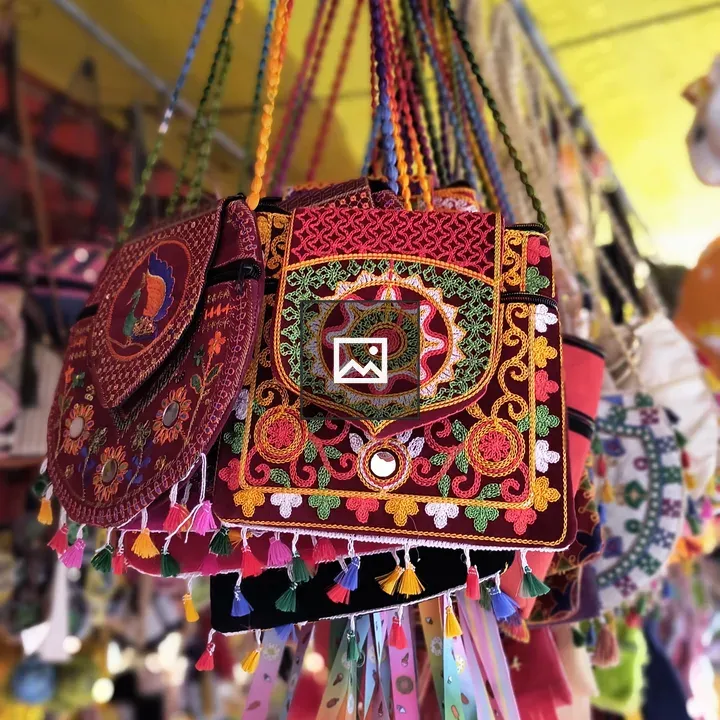 Colorful embroidered sling bags
