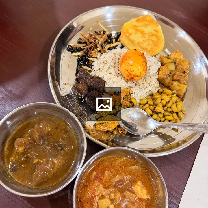 Oats dish with fried foods and egg