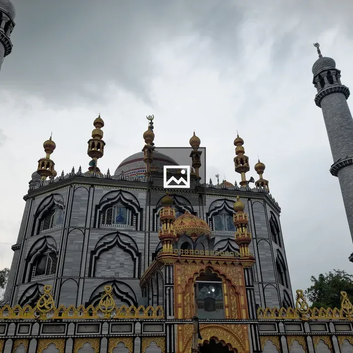 Ornate mosque with two minarets