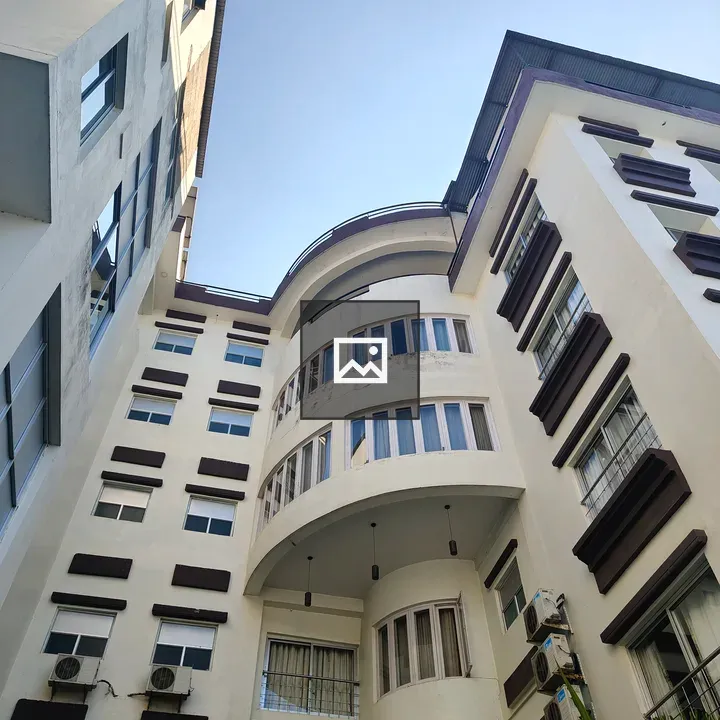Modern multi-story building viewed from below
