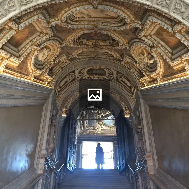 Indoor stonework stairs with frescoes
