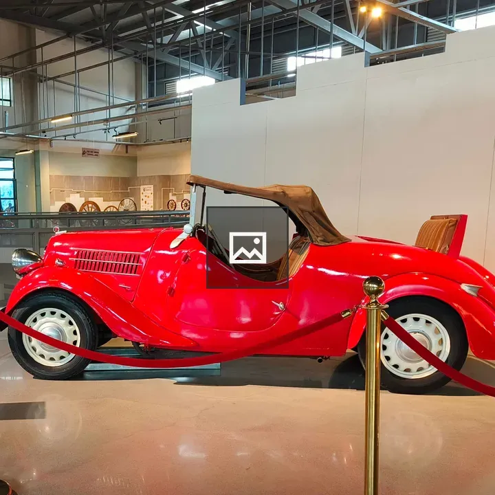 Red Vintage Convertible Car Indoors