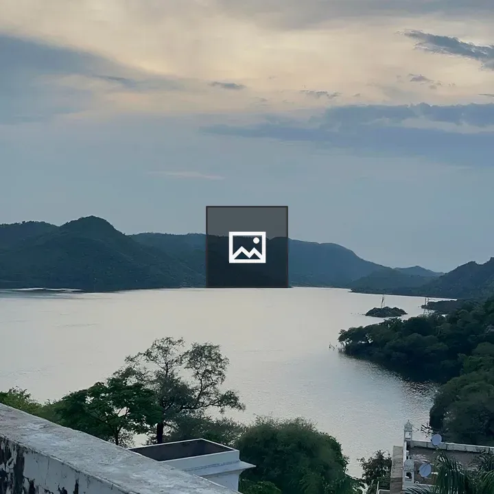 Lake and mountains twilight view