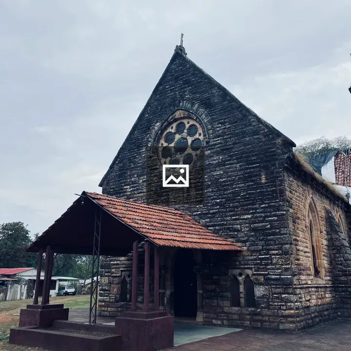 Historic stone church with stained glass